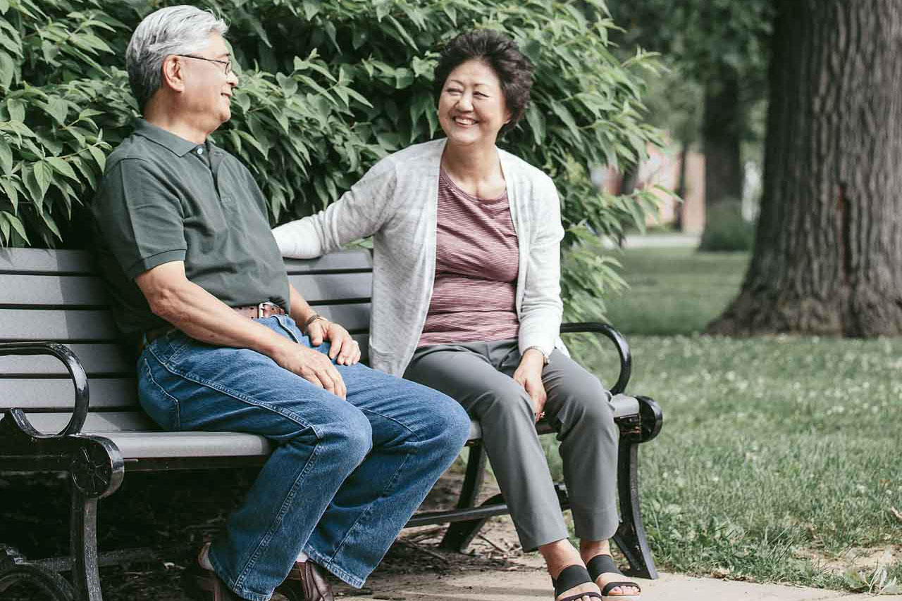 senior couple on a park bench
