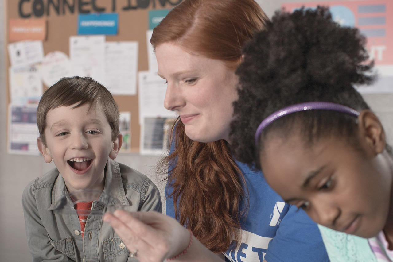 teacher with 2 students